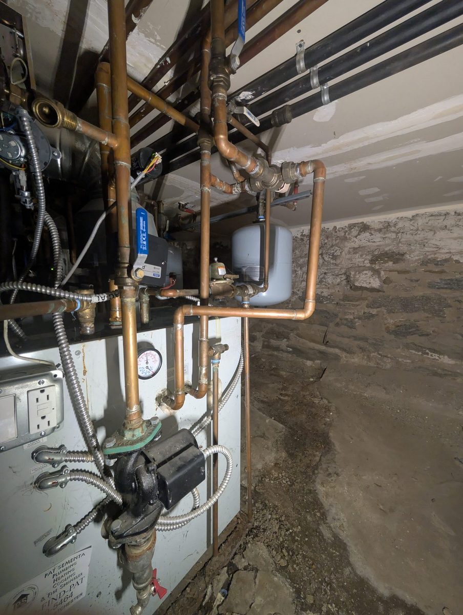 Boiler room piping and circulator pump