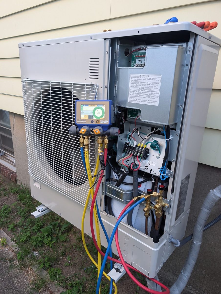 Heat pump outdoor unit, gauges connected